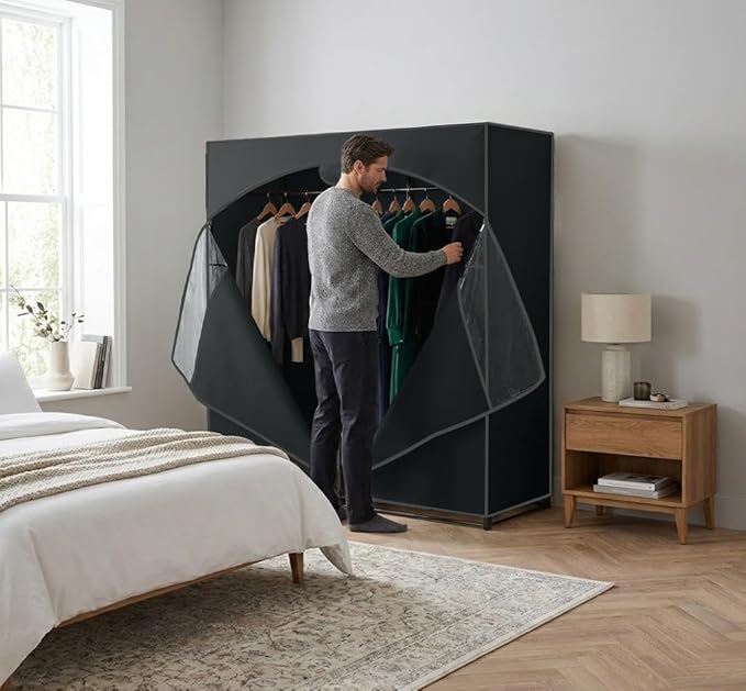 HOLDN’ STORAGE Portable Wardrobe Closet - 65 lb Large Capacity, Internal Heavy Duty Metal Rod, Zipper & Clear Window, Durable Clothes Organizer, Tool-Free Easy Assembly, Black Canvas Cover
