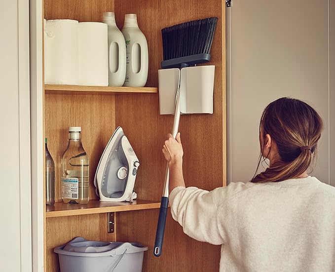 Joseph Joseph CleanStore Wall-Mounted Adjustable Long Handle Broom Sweeper with Dust-Shield Storage, Indoor Sweeping Floor Brush with Soft Bristles and Comb